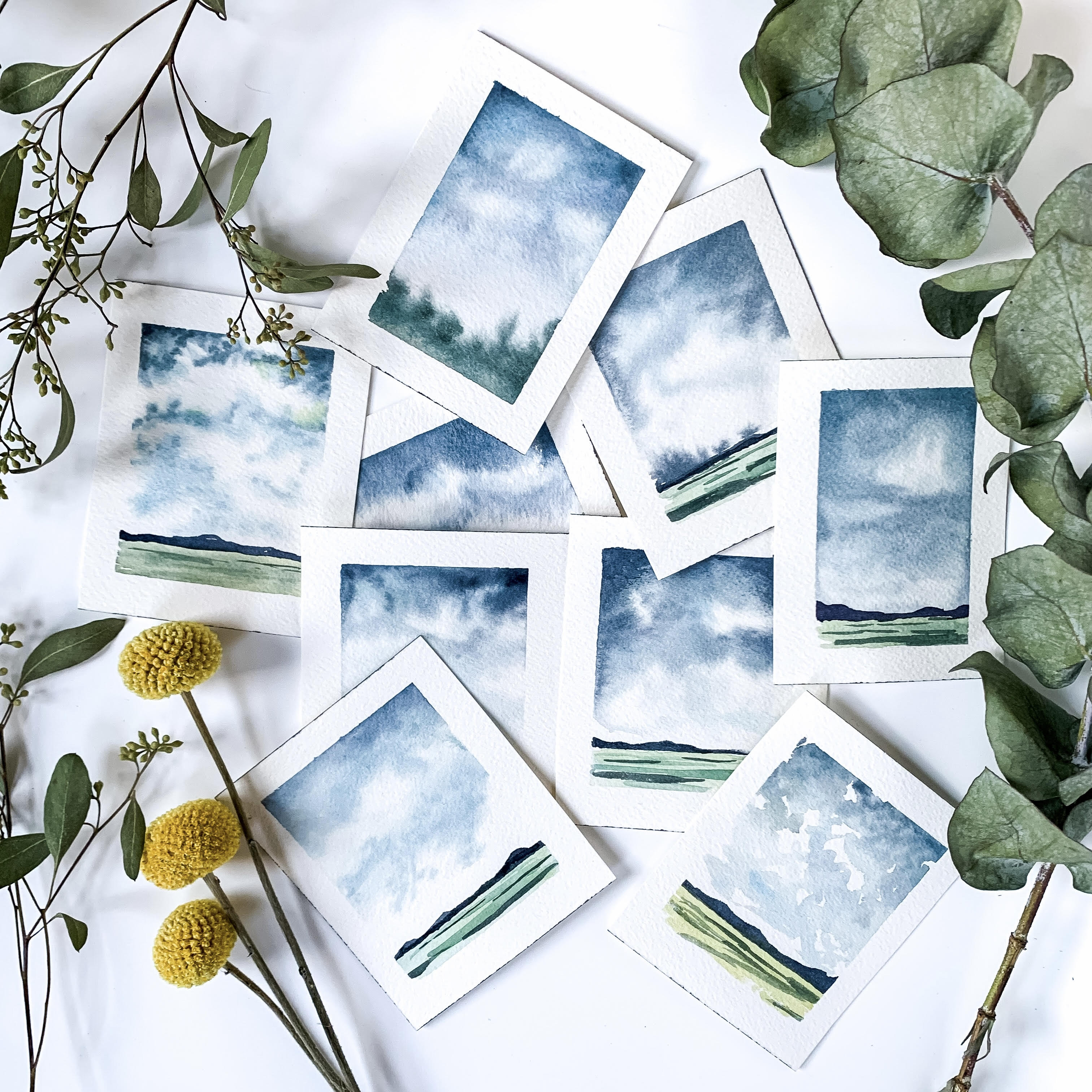 pile of watercolor landscapes