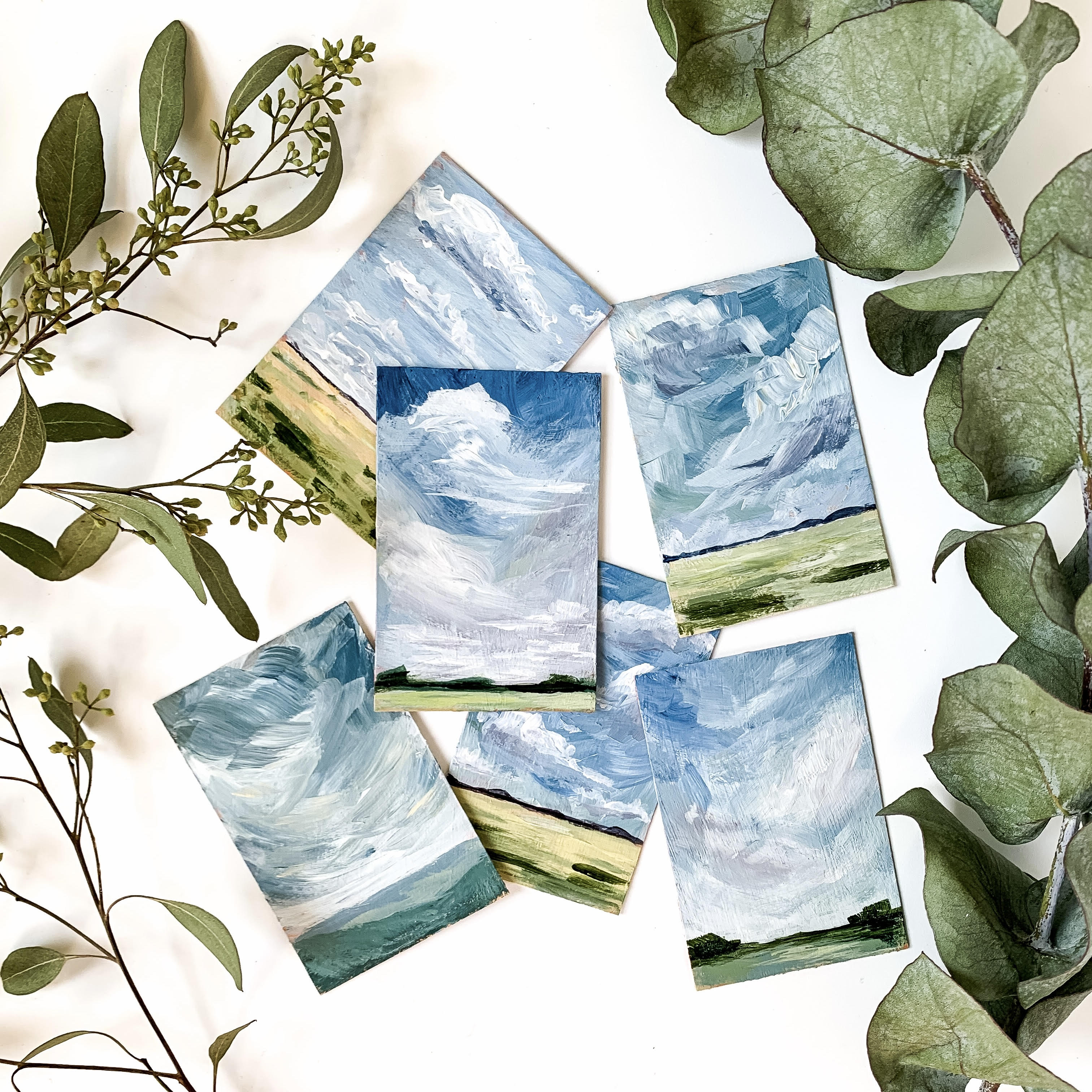 collage of mini acrylic landscape paintings